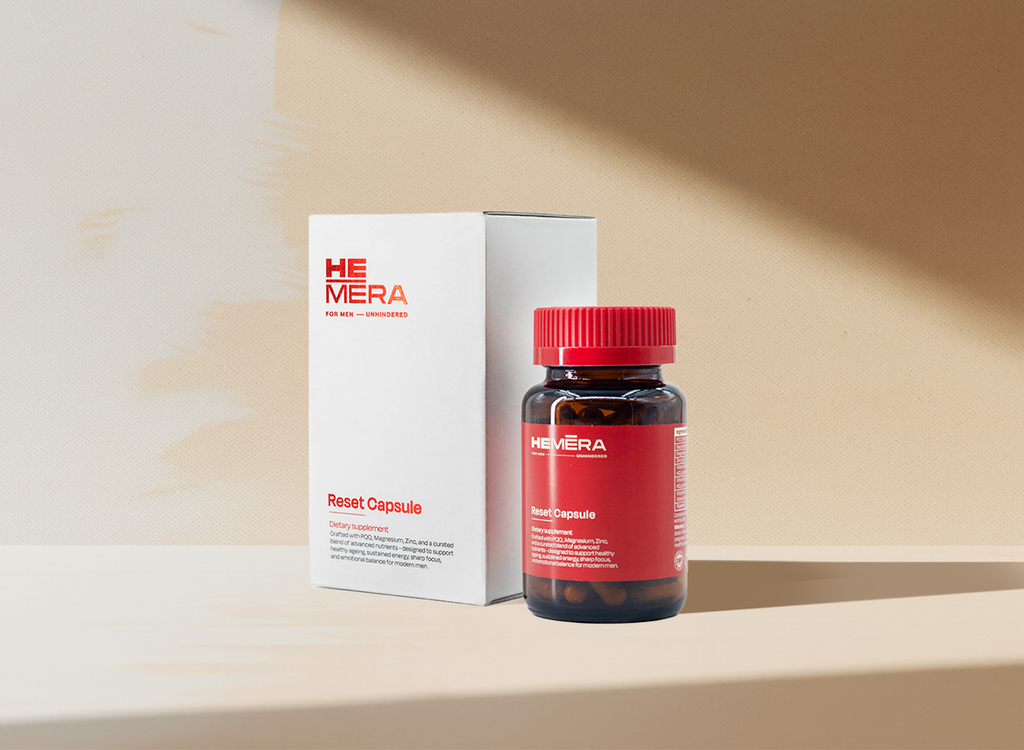 HEMERA Reset Capsule bottle and packaging on a beige background