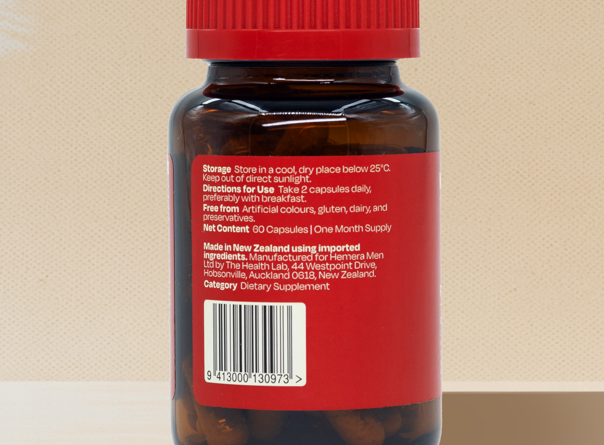 reset capsule Bottle with a red label on a beige background