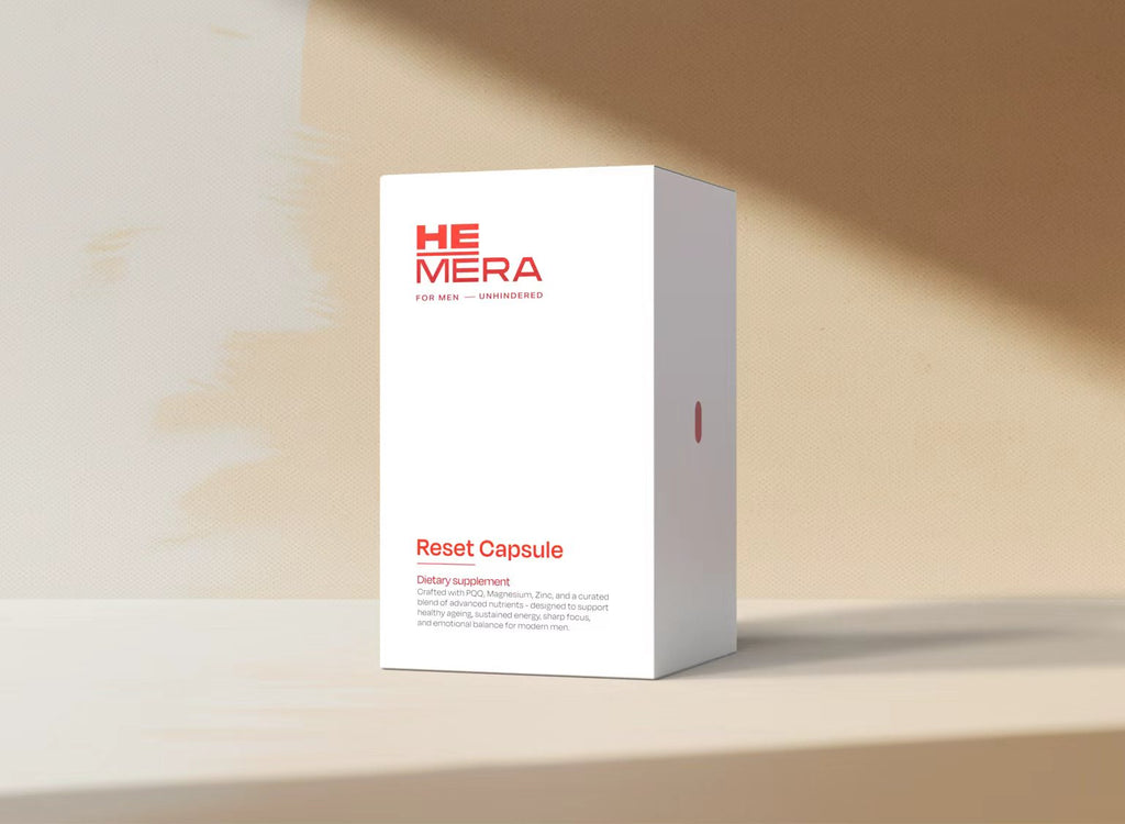 White box with red text labeled 'HEMERA' on a beige background